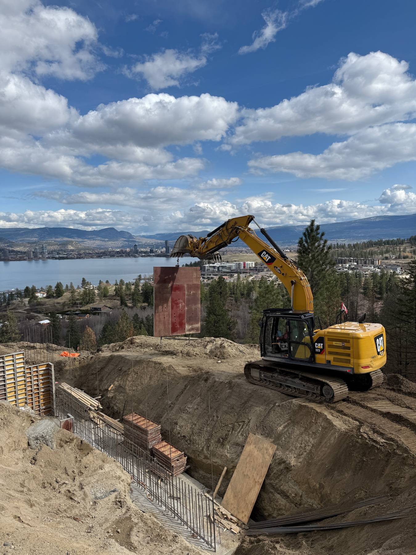 Excavator working at a construction site, outdoors.